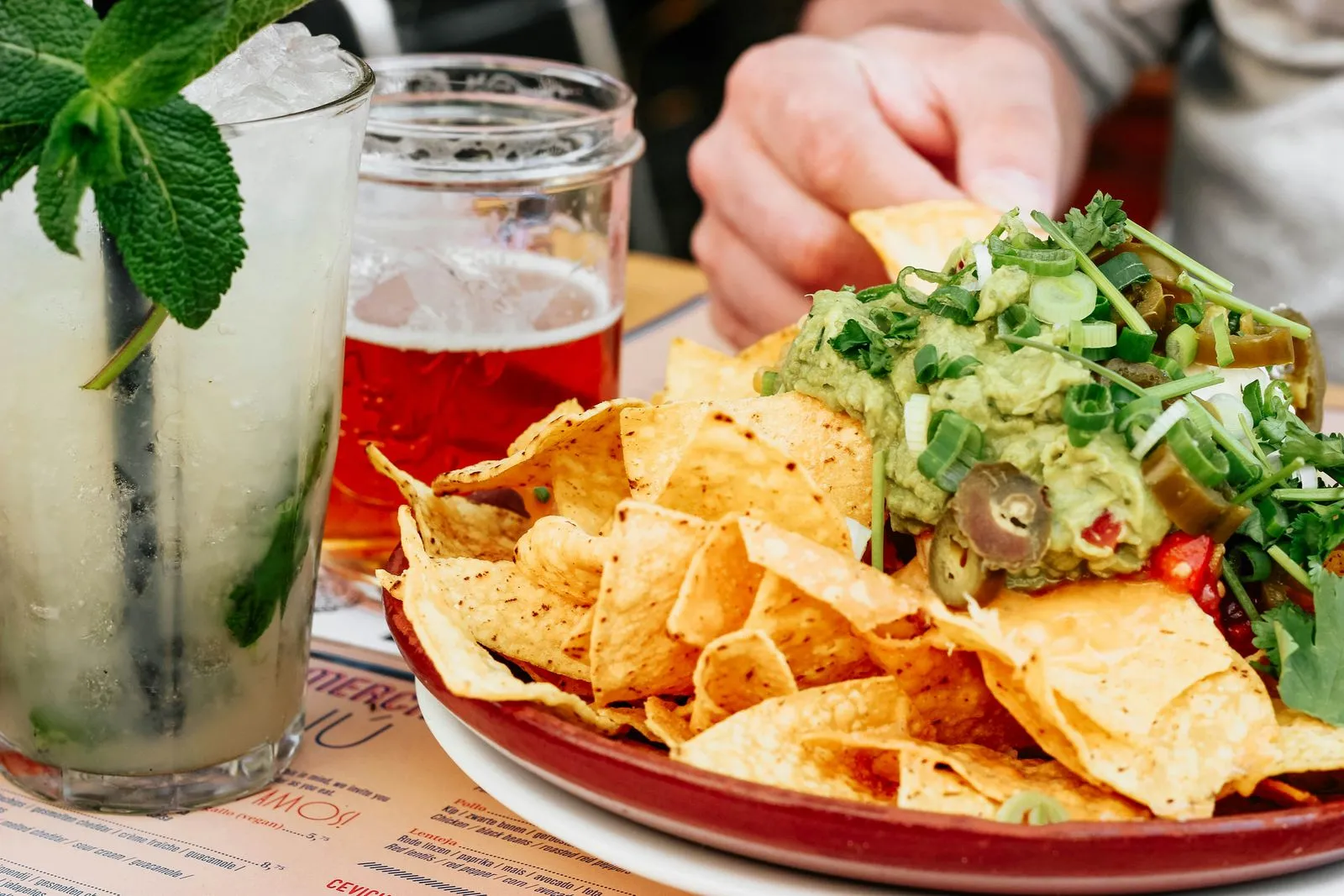 Plate of nachos with guacamole